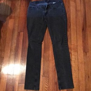 Black Levi 524 customized skinny jeans w/ studs